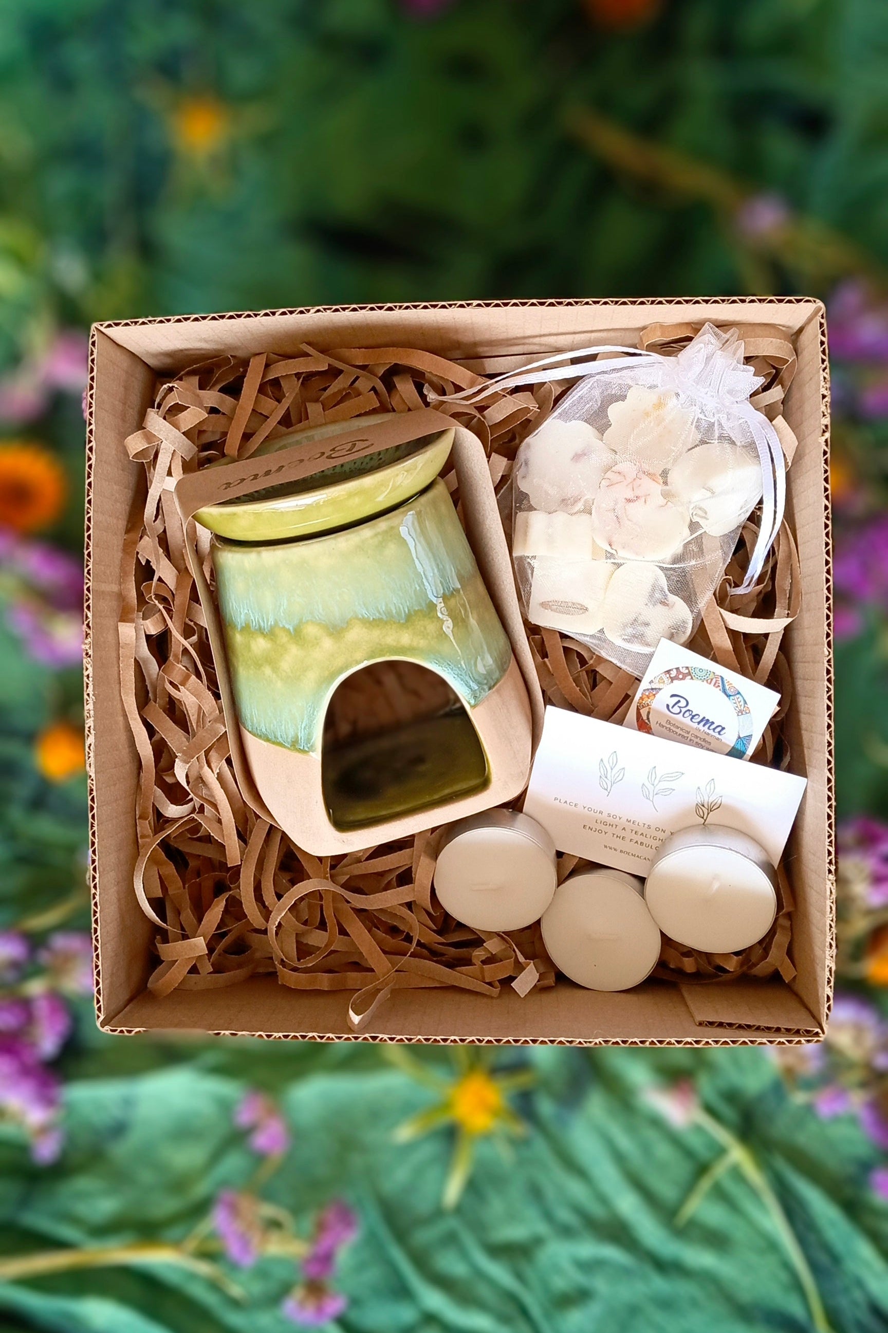 green oil diffuser in a box with ax melts and candles gift box